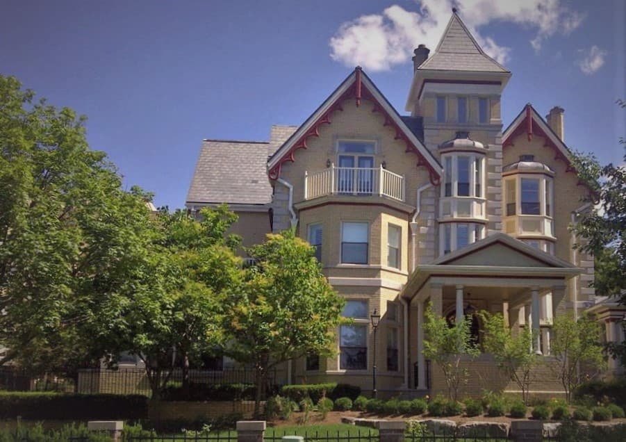 Bright living room with freshly painted white walls and trim in a Hamilton, Ontario home