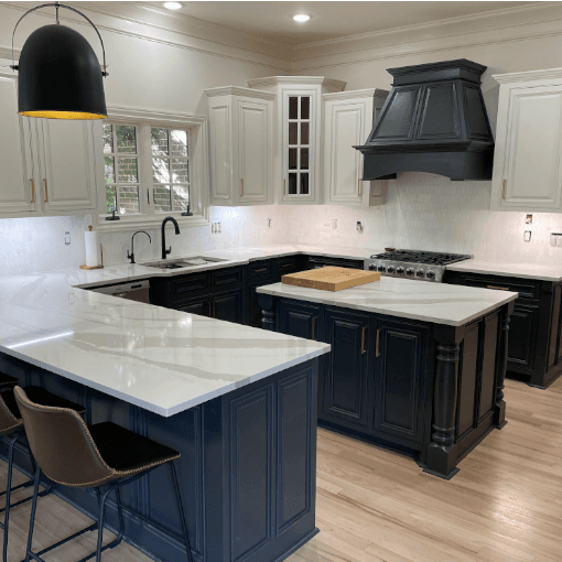 Kitchen cabinets refinished and painted dark blue by Bay City Painters in Hamilton, Ontario